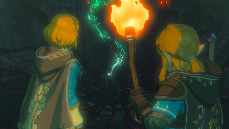 Link y Zelda caminando por una cueva.